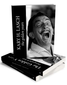 Surrealist painter Salvador Dali mid shout or laugh with mouth and eyes wide open, on cover of 'Kary H. Lasch The Golden Years', by Booxencounters.