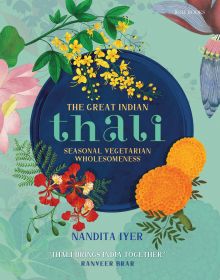 Book cover of The Great Indian Thali, Seasonal Vegetarian Wholesomeness, with a blue plate with colorful orange, yellow, and pink flowers. Published by Roli Books.