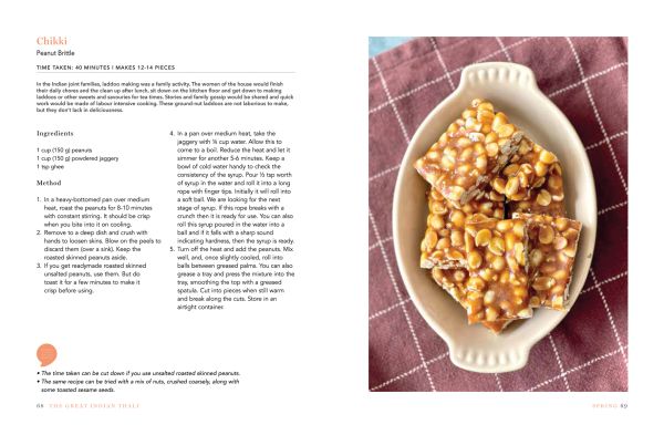 Book cover of The Great Indian Thali, Seasonal Vegetarian Wholesomeness, with a blue plate with colorful orange, yellow, and pink flowers. Published by Roli Books.