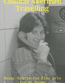 Book cover of Chantal Akerman: Travelling, with the artist smiling while holding a telephone. Published by Lannoo Publishers.