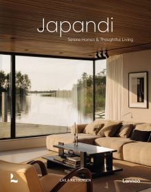 Book cover of Japandi: Serene Homes and Thoughtful Living, with a calming, natural color living interior with soft sofas and a view through large windows of a lake. Published by Lannoo Publishers.