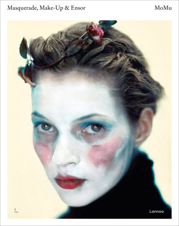 Book cover of Masquerade, Make-up & Ensor, with a portrait of a young Kate Moss wearing pale make-up, by Paolo Roversi, 1993. Published by Lannoo Publishers.