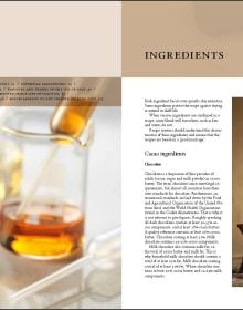 Book cover of Fine Chocolates: Gold; with two luxury chocolates with caramel swirls on top. Published by Lannoo Publishers.