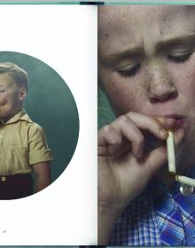 Young blonde child in sleeveless white and green dress, smoking a cigarette, on cover of 'The Sweetest Taboo', by Lannoo Publishers.