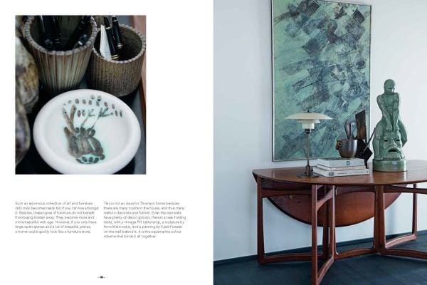 Book cover of Nordic Moods: A Guide to Successful Interior Decoration, featuring a minimalist dining interior, table and chairs, low light fixing, white walls. Published by Lannoo Publishers.