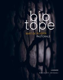 Close up of dark textured aubergine color vegetable, on cover of 'Biotope, Pastorale', by Lannoo Publishers.