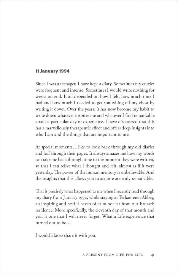 Blue globe on blue banner, repeated blue floral print border, on cover of 'The Book of Noble Purpose'; by Lannoo Publishers.