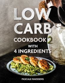 Plate of fish cakes on bed of green cabbage, pot of utensils to side, on cover of 'Low Carb Cookbook with 4 Ingredients 2, by Lannoo Publishers.