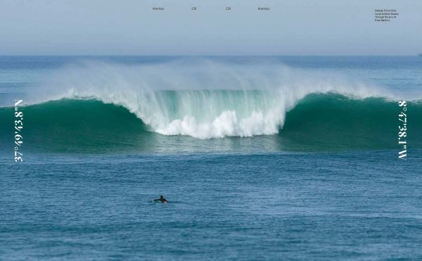 Aerial view of pale green sea with surfers on boards, on cover of 'Surf & Stay', by Lannoo Publishers.