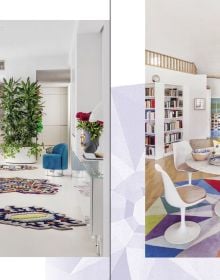 Living interior with navy wall panelling, large black and white rug, arch windows, on cover of 'Carpets & Rugs, Every home needs a soft spot', by Lannoo Publishers.