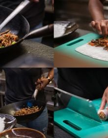 Asian style chicken dish in restaurant kitchen, chef topping with herbs, on cover of 'The Thai Kitchen of Boo Raan, Sharing Recipes From Dokkoon Kapueak', by Lannoo Publishers.