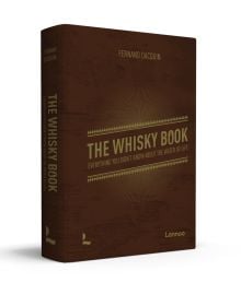 Rich brown cover of 'The Whisky Book, Everything you didn’t know about the water of life', by Lannoo Publishers.