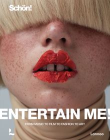 Model with freckled face, blonde fringe covering eyes and orange petals on lips, on cover of 'Entertain me! by Schön magazine, From music to film to fashion to art', by Lannoo Publishers.