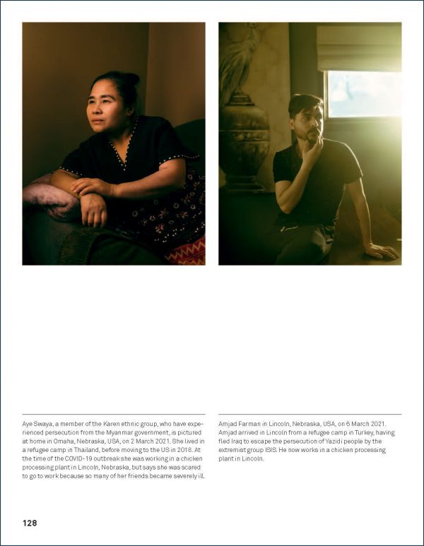 Book cover of World Press Photo 2022, with orange and cream summer dresses hanging from three wooden crosses in ground. Published by Lannoo Publishers.