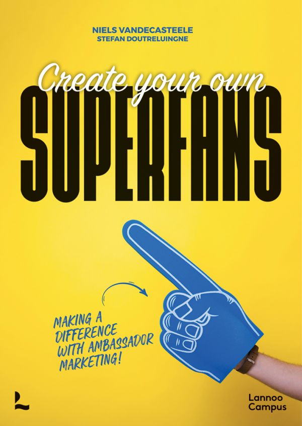 Book cover of Create Your Own Superfans, Making a Difference With Ambassador Marketing, with a giant blue foam pointed finger. Published by Lannoo Publishers.