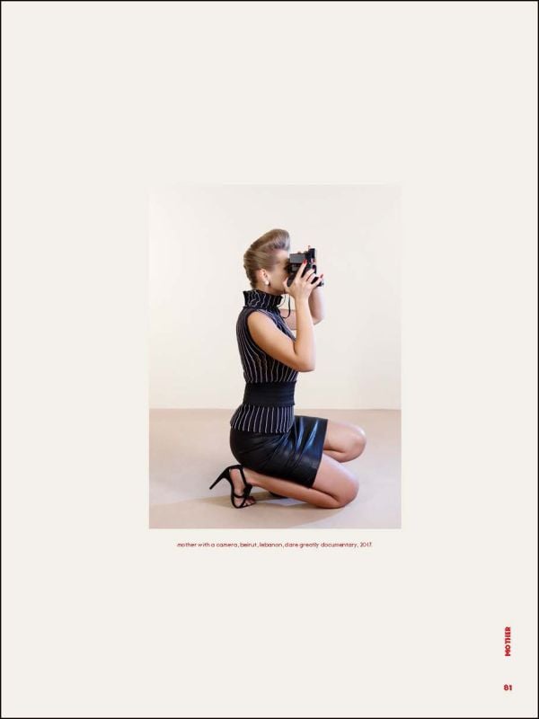 Book cover of Eli Rezkallah, Life in Plastik, with a model in pink tunic and hat, standing behind shelves of pink plastic product bottles. Published by Lannoo Publishers.