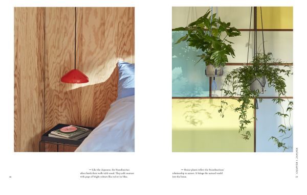 Book cover of Japandi Living, Japanese Tradition. Scandinavian Design, with a calm, interior living space with pale wood table and chairs, low light fixture, and white sofa. Published by Lannoo Publishers.