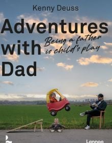 Book cover of Adventures With Dad Being a Father is Child's Play, with a father sitting next to playing field with two small children, one flying off ramp in plastic car. Published by Lannoo Publishers.