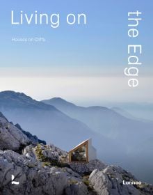 Book cover of Living on the Edge, with a modern home with glass side, built on cliff edge with mountains behind. Published by Lannoo Publishers.