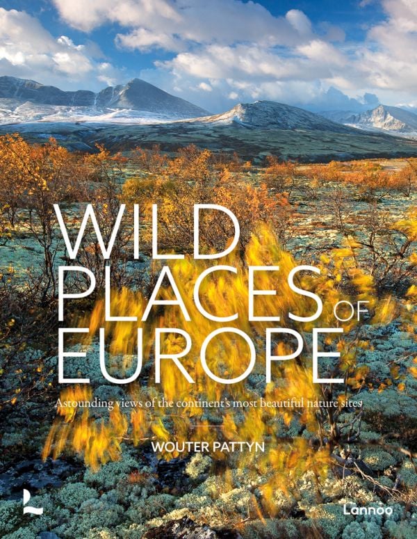 Book cover of Wild Places of Europe, with European landscape and mountains behind. Published by Lannoo Publishers.
