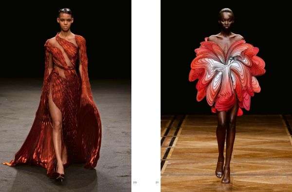 Book cover of Iris van Herpen, Sculpting the Senses, with model wearing white sculptural snake-like shoulder piece. Published by Lannoo Publishers.