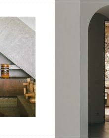 Book cover of Bea Mombaers, Items & Interiors, with interior living space with wood table, white walls. Published by Luster Publishing.