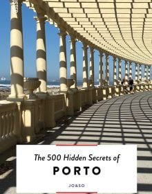 Book cover of The 500 Hidden Secrets of Porto with columned balustrade. Published by Luster Publishing.