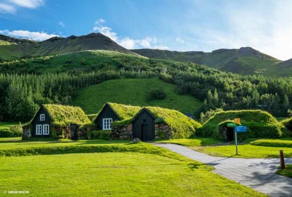 Book cover of Hidden Iceland, with an aerial view of mountainous landscape. Published by Luster Publishing.