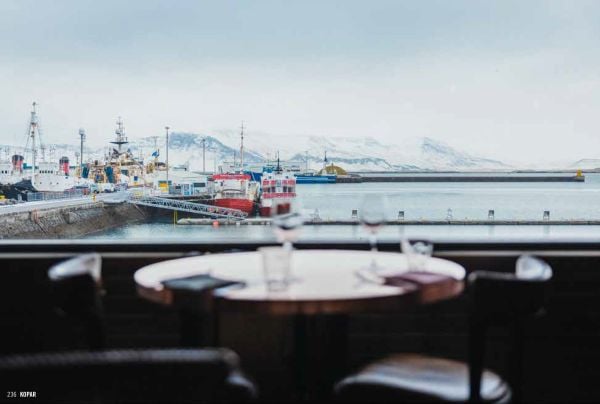 Book cover of Hidden Iceland, with an aerial view of mountainous landscape. Published by Luster Publishing.