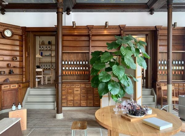 Book cover of The 500 Hidden Secrets of Copenhagenm with the Cykelslangen cyclists bridge. Published by Luster Publishing.