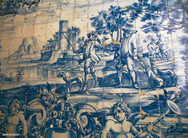 Book cover of The 500 Hidden Secrets of Lisbon, with a row of towering palm trees down sunny street. Published by Luster Publishing.