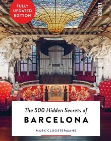 Book cover of The 500 Hidden Secrets of Barcelona, with an interior of concert hall of the Palau de la Música Catalana. Published by Luster Publishing.