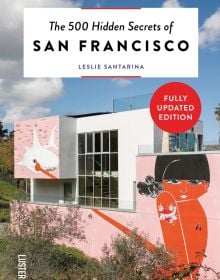 Pink mural on wall of Helipad House, lady with tattoo, finger on sharks eyeball, on cover of 'The 500 Hidden Secrets of San Francisco', by Luster Publihsing.