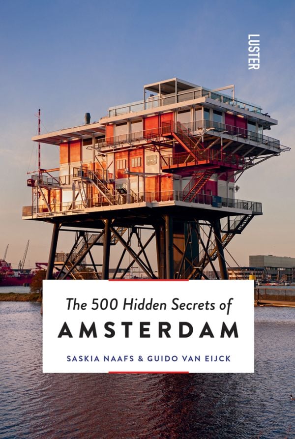 Book cover of The 500 Hidden Secrets of Amsterdam, with REM Island, with sea platform on stilts housing a restaurant. Published by Luster Publishing.