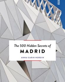 Book cover of The 500 Hidden Secrets of Madrid, with the white exterior of ABC Museum in Madrid. Published by Luster Publishing.