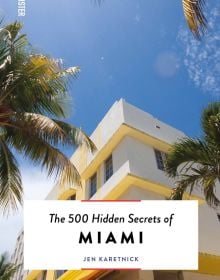 Book cover of The 500 Hidden Secrets of Miami, with Art deco hotel surrounded by palm trees. Published by Luster Publishing.