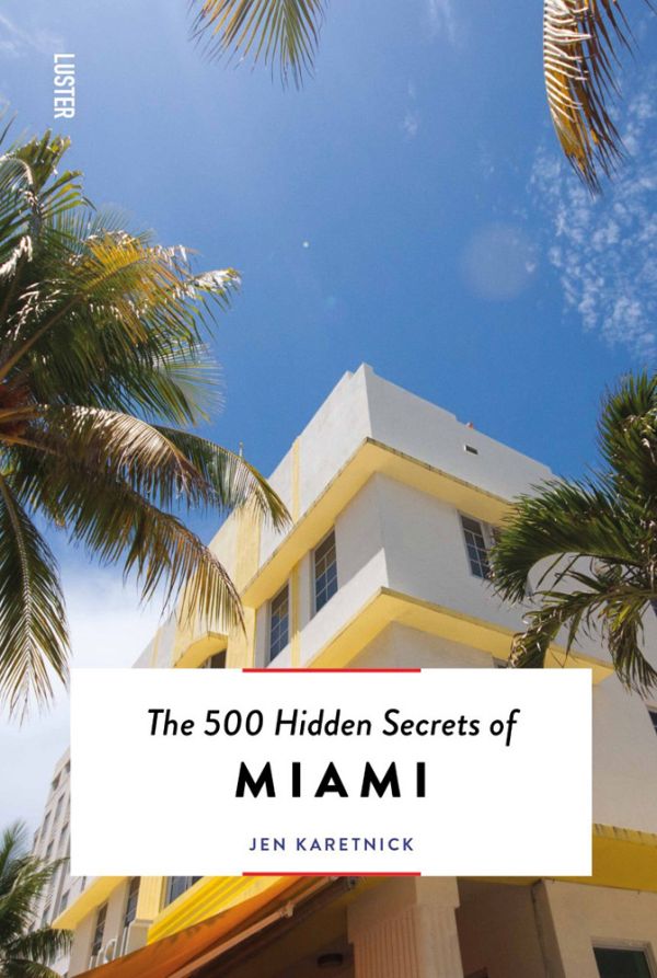 Book cover of The 500 Hidden Secrets of Miami, with Art deco hotel surrounded by palm trees. Published by Luster Publishing.