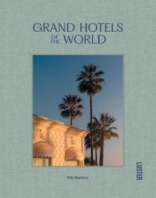 Corner of roof of the Carlton Cannes Hotel, France, with tall palm trees, on lint green linen cover of 'Grand Hotels of the World', by Luster Publishing.