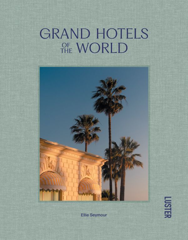 Book cover of Grand Hotels of the World, with the corner of roof of the Carlton Cannes Hotel, France, with tall palm trees. Published by Luster Publishing.
