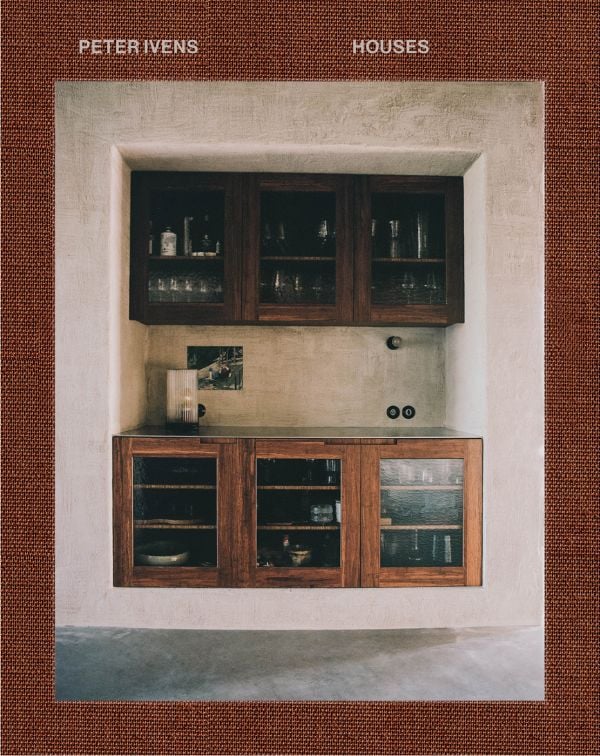 Book cover of Peter Ivens - Houses, with an interior room with dark wood wall cupboards with crockery. Published by Luster Publishing.