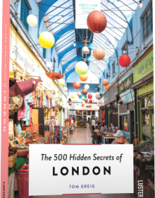 Book cover of The 500 Hidden Secrets of London, featuring Brixton Village market. Published by Luster Publishing.