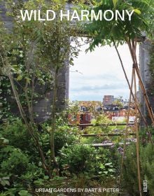 Book cover of Wild Harmony: Urban Gardens by Bart & Pieter; featuring a garden with a view to residential homes. Published by Luster Publishing.