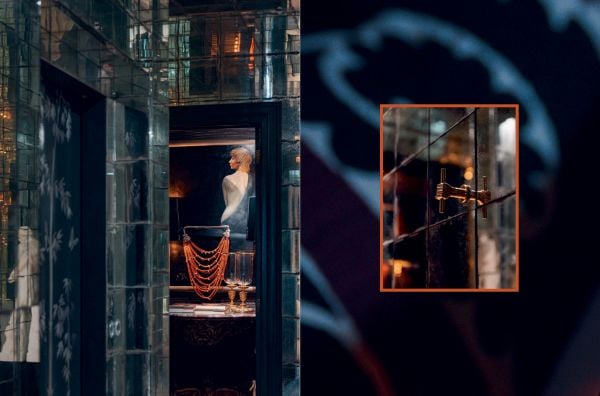 Book cover of Grand Interiors, featuring a floral wallpaper. Published by Luster Publishing.