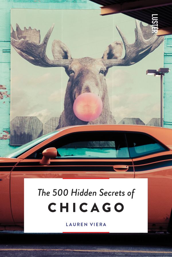Book cover of The 500 Hidden Secrets of Chicago; featuring a large mural of a moose blowing a pink bubblegum bubble, with an orange car parked in the foreground. Published by Luster Publishing.