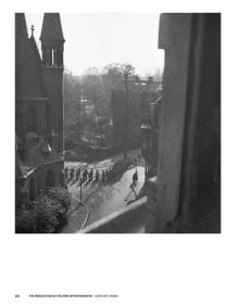 Book cover of The Persecution of the Jews in Photographs, The Netherlands 1940-1945', featuring a Jewish couple walking through a square in Amsterdam. Published by WBooks.