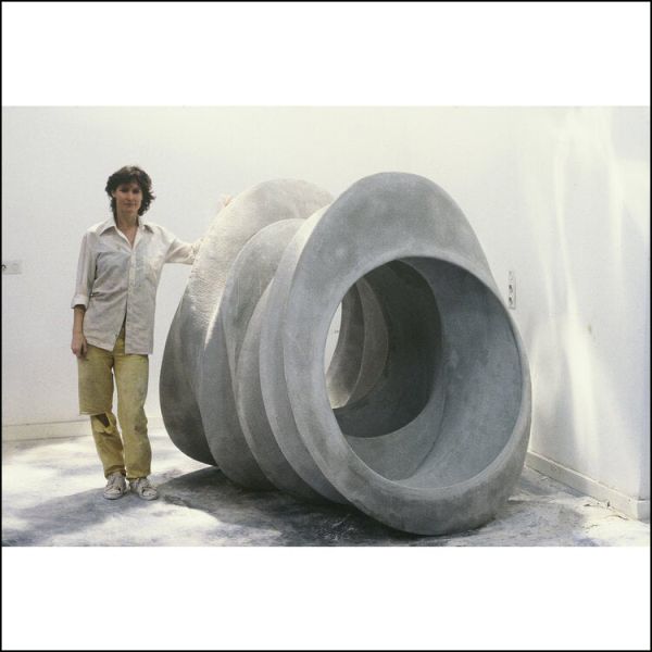 Book cover of Barbara Nanning - Eternal Movement, Ceramics, Installations and Glass Art, featuring a fark blue ceramic vessel with curved edges and bright gold interior. Published by Waanders Publishers.