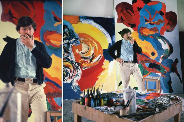 Book cover of APPEL: A life in photographs by Nico Koster, with the artist standing next to a large colorful sculpture. Published by Waanders Publishers.