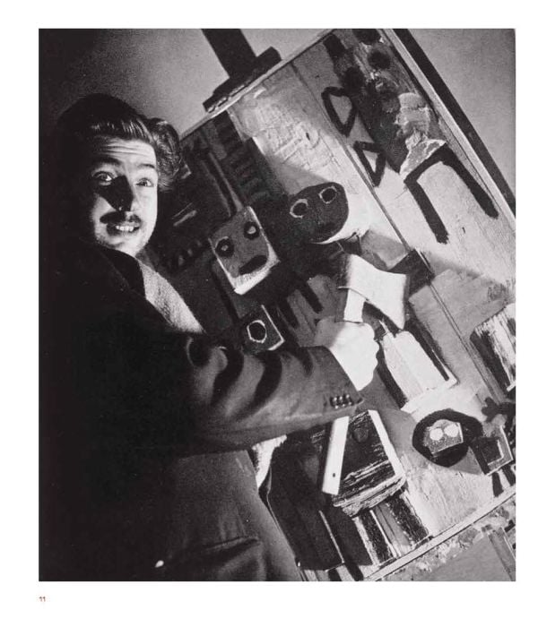 Book cover of Freedom without borders, with raspberry coloured paint daubed on surface. Published by Waanders Publishers.