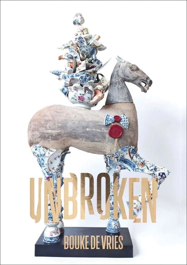 Book cover of Bouke de Vries: Unbroken; featuring a sculpture of horse with a file of crockery on its back. Published by Waanders Publishers.
