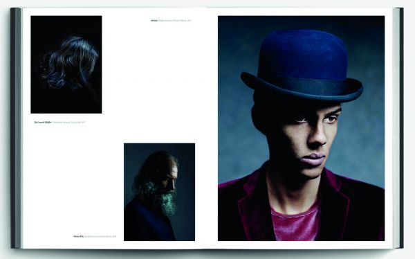 Capitalized red font down center of dark green cover of 'Present', by Hannibal Books.